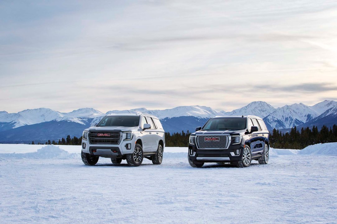(L to R) 2021 GMC Yukon AT4 and Denali